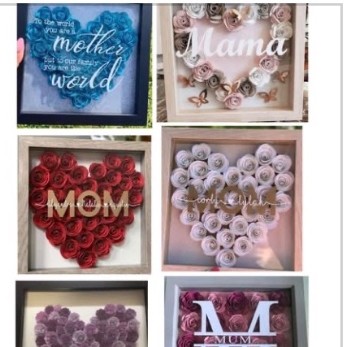 Collection of paper rose shadow boxes spelling Mom, Mama and M
